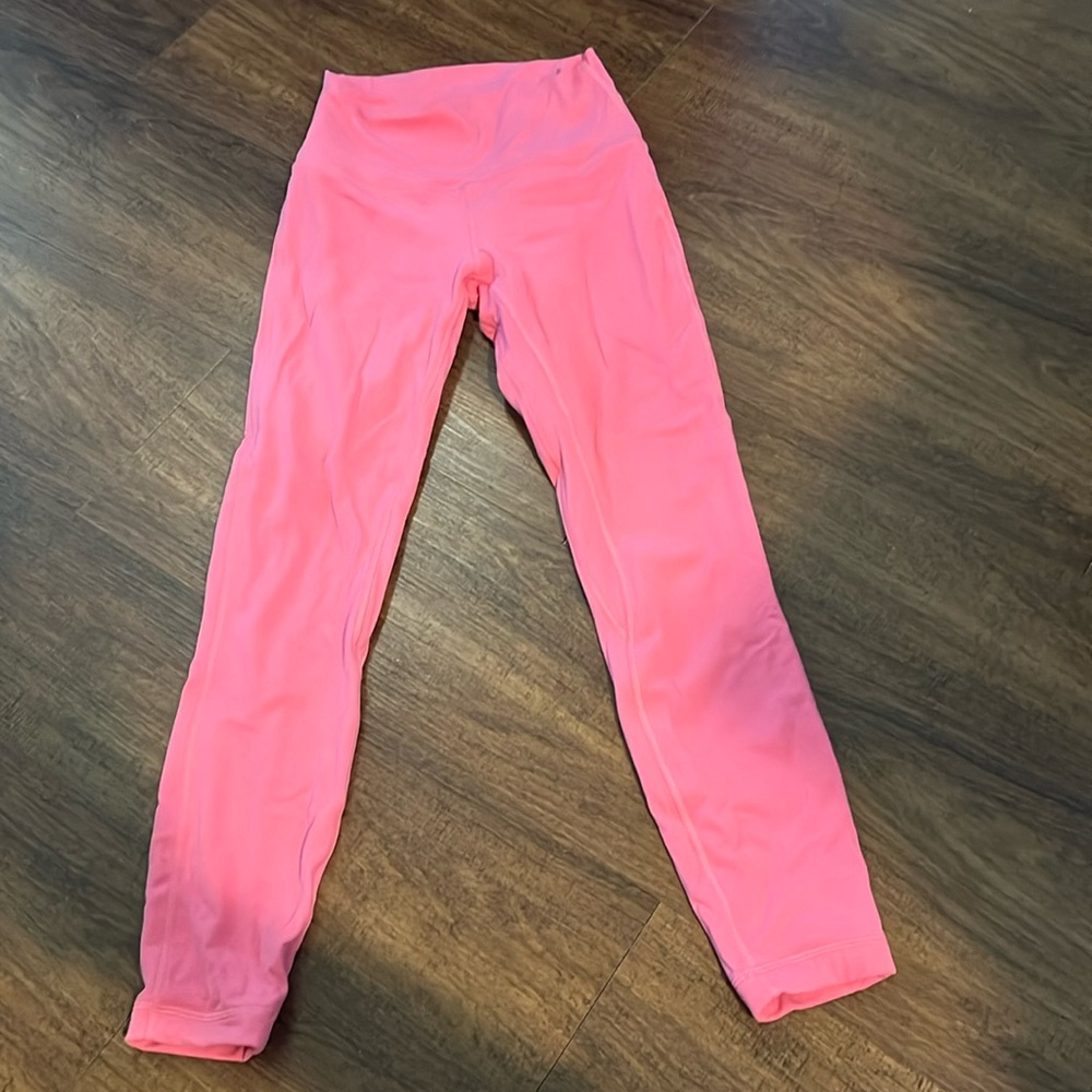 Pink lululemon size 4 leggings, 25 inch, double lined! Perfect condition!